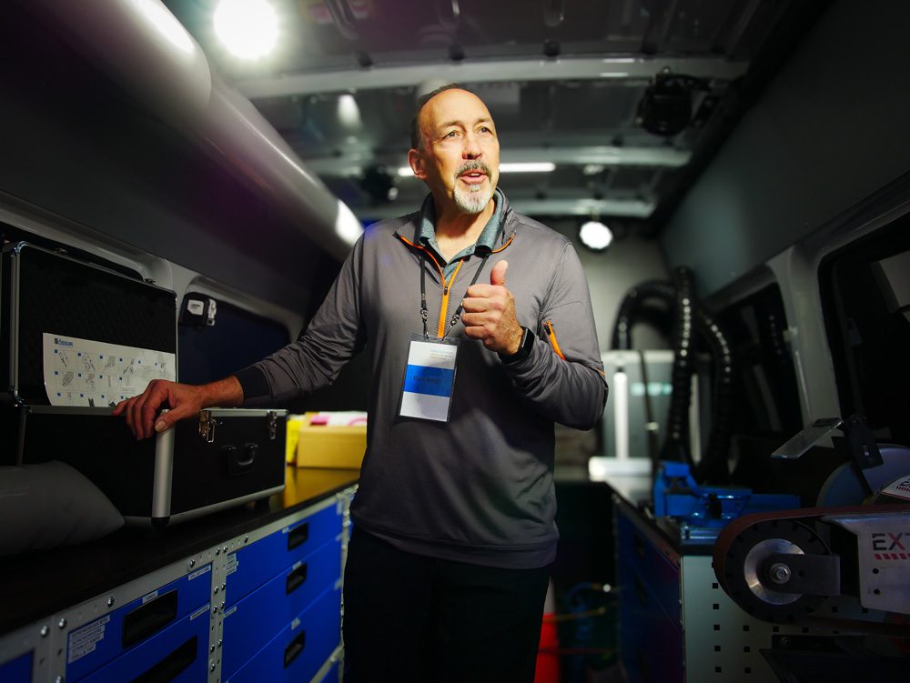 Prosthetist, Paul Bargh demonstrating the inner workings of a mobile workshop.